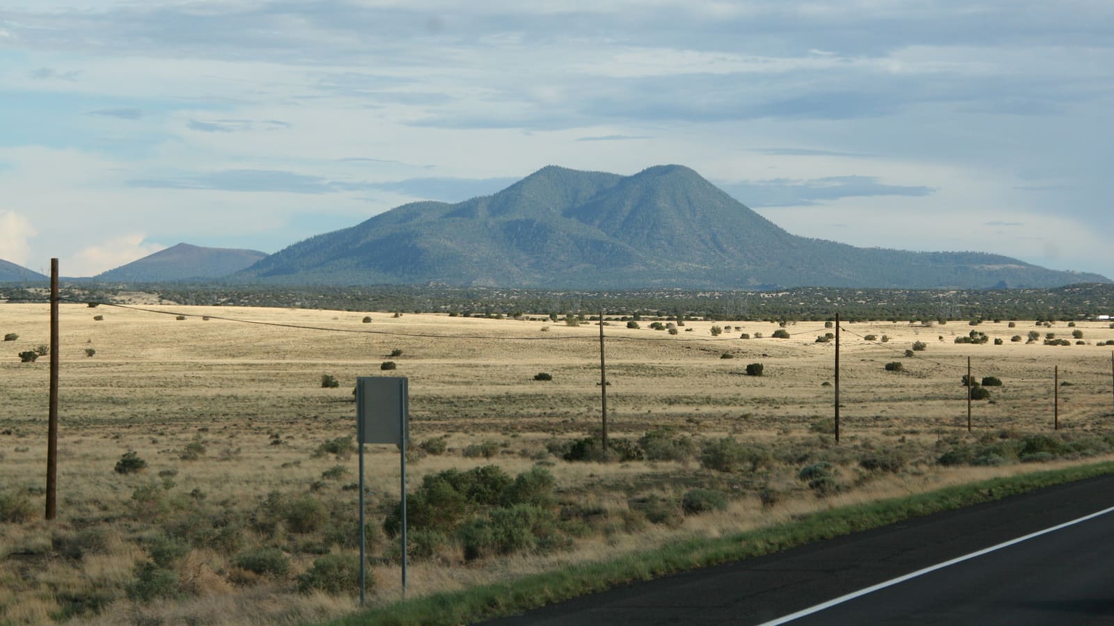 The San Francisco Peaks rising above the pine forest north of Flagstaff, Arizona